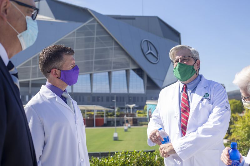 In this file photo, Dr. Jim Fortenberry, speaks at a press conference near the Mercedes Benz Stadium and urges people to get vaccinated to help slow the spread of the coronavirus. (Rebecca Wright for the Atlanta Journal-Constitution)