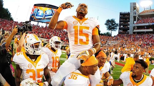 ATHENS, GA - OCTOBER 1: Jauan Jennings #15 of the Tennessee Volunteers rides the shoulders of Gavin Bryant #36 after making the game winning catch against the Georgia Bulldogs at Sanford Stadium on October 1, 2016 in Athens, Georgia. (Photo by Scott Cunningham/Getty Images)