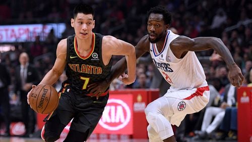 Jeremy Lin of the Atlanta Hawks drives past Patrick Beverley  of the LA Clippers during a 123-118 Hawks win at Staples Center on January 28, 2019 in Los Angeles, California. (Photo by Harry How/Getty Images)