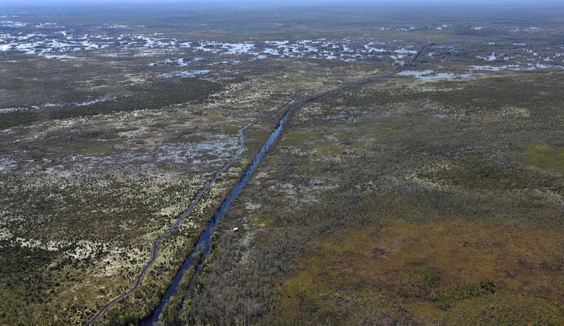 Aerial photograph shows the Okefenokee Swamp on Tuesday, Mar. 19, 2024, in Folkston. (Hyosub Shin / Hyosub.Shin@ajc.com)