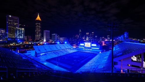 Georgia Tech lit Bobby Dodd Stadium blue on Saturday night for 44 minutes in honor of the late Hank Aaron. (Danny Karnik/Georgia Tech Athletics)
