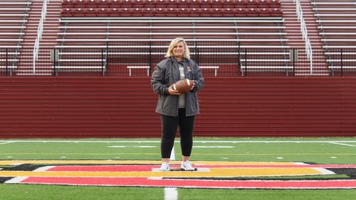 Roseanna Smith is director of football operations and running-backs coach at Oberlin College, a school in Oberlin, Ohio, that has a Division III football program. Smith played football for the Atlanta Xplosion, and in the early years of her coaching journey she coached at Winder-Barrow, West Hall and Flowery Branch high schools in North Georgia. (Photo courtesy of Oberlin Athletics)