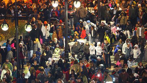 Spectators fill the plaza for the Peach Drop at Underground Atlanta. CURTIS COMPTON / CCOMPTON@AJC.COM