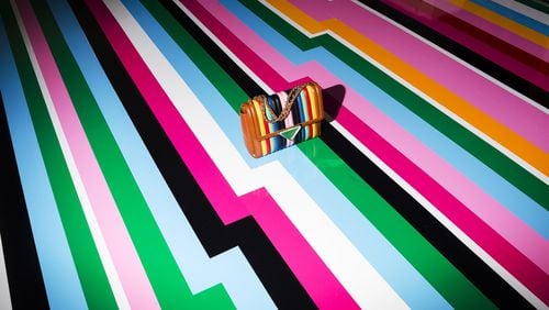 “Ferragamo (Stripes)” by Landon Nordeman is featured in the exhibition “On the Edge” at Buckhead’s Spalding Nix Fine Art.
