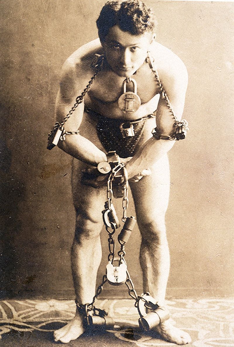 Escape artist Harry Houdini poses with chains and handcuffs, circa 1899. Visitors can learn more about Houdini’s life, including his infrequently examined Jewish heritage, at the new exhibition “Inescapable: The Life and Legacy of Harry Houdini” at Atlanta’s Breman Museum. Contributed by the Breman Museum
