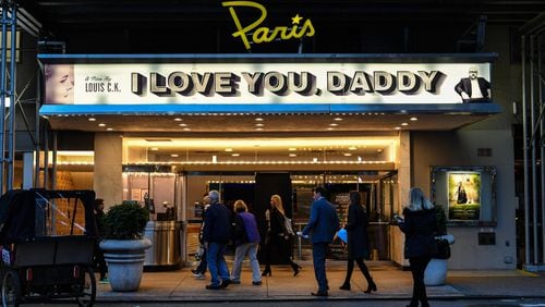 An exterior view of The Paris Theatre with a marquee advertising the Louis C.K. movie "I Love You, Daddy" on November 9, 2017 in New York City.  The premiere for the movie was canceled after Louis C.K. was accused of sexual misconduct by five women was reported by the New York Times.