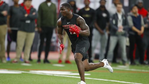 Georgia running back Sony Michel participates in a drill during Georgia Pro Day, Wednesday, March 21, 2018, in Athens. Pro Day is intended to showcase talent to NFL scouts for the upcoming draft. (AP Photo/Todd Kirkland)