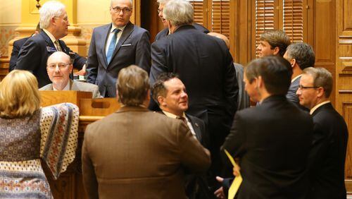 March 16, 2016 Atlanta: Lt. Gov. Casey Cagle, top left, listens to Senators while preparing for the debate over a rewritten "religious liberty" bill passed by the House on Wednesday evening March 16, 2016. Senators proposed several additional amendments to the bill. Ben Gray / bgray@ajc.com