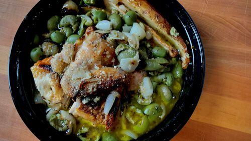 Pollo Amalfi, bedecked with roasted cipollini onions and whole olives, is a delicious choice from Gio's Chicken Amalfitano. Henri Hollis/henri.hollis@ajc.com