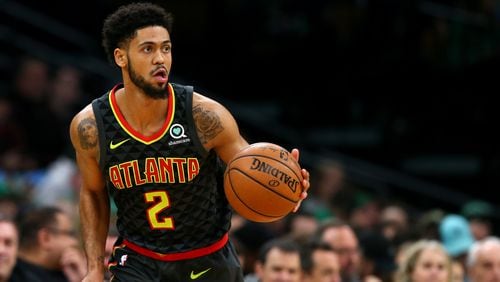 Tyler Dorsey of the Atlanta Hawks dribbles against the Boston Celtics during the first quarter at TD Garden on December 14, 2018 in Boston, Massachusetts. (Photo by Maddie Meyer/Getty Images)