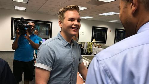 Fred Blankeship of Channel 2 Action News interviews Caleb Lee Hutchinson, who visited the WSB building Tuesday morning as part of his 'American Idol" hometown visit. CREDIT: Rodney Ho/rho@ajc.com