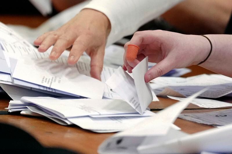 Counting begins at the Blackpool South by-election at Blackpool Sports Centre in Blackpool, England, Thursday, May 2, 2024. The by-election was triggered after the resignation of Scott Benton. (Peter Byrne/PA via AP)