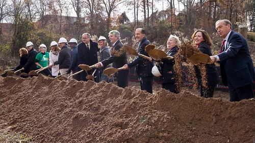 Community members and members of the local, state and national government participate in a groundbreaking ceremony at the site of the Peachtree Creek Greenway in Brookhaven on Wednesday, December 12, 2018. (ALYSSA POINTER/ALYSSA.POINTER@AJC.COM)