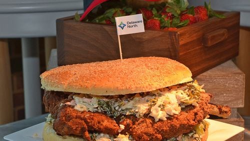 170323 Atlanta, Ga (Suntrust Park): The Pork Tomahawk Chop sandwich at Chop House is one of the offerings for the 2017 Braves season at Suntrust Park. The Atlanta Braves and Delaware North Sportservice, the hospitality and food service provider for the Atlanta Braves, host a tasting tour of the soon to be opened Suntrust Park to reveal the food and beverage options available for the 2017 season. All photos taken Thursday March 23, 2017 at Suntrust Park 755 Battery Avenue, Smyrna, Ga 30339. (Chris Hunt/Special) for story slugged 041417Bravesdishes