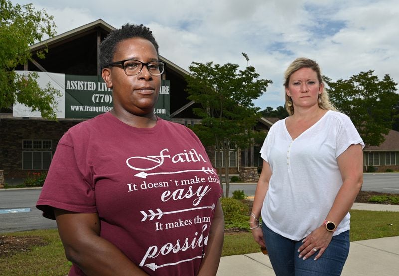 Former executive directors Tiffany Echols, left, and Nikki Windsor stand outside Tranquil Gardens Assisted Living & Memory Care in Acworth on Wednesday. Windsor said she slowly learned about the financial troubles and now wishes that she had warned residents. (Hyosub Shin / Hyosub.Shin@ajc.com)