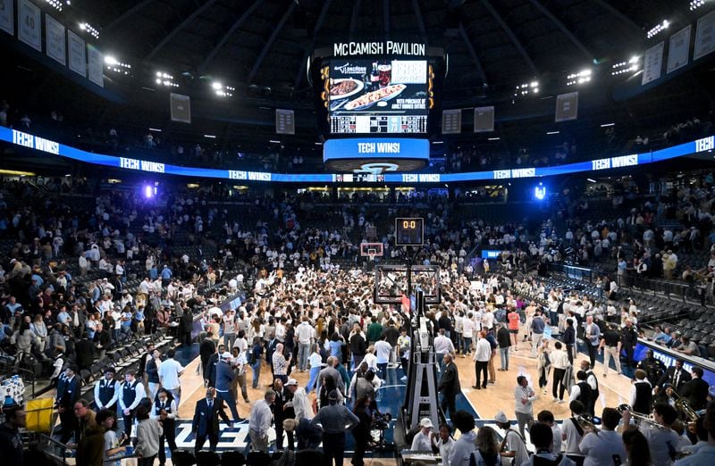 Fans storm the court as Georgia Tech celebrates the victory over North Carolina in an NCAA college basketball game at Georgia Tech’s McCamish Pavilion, Tuesday, January 30, 2024, in Atlanta. Georgia Tech won 74-73 over North Carolina. (Hyosub Shin / Hyosub.Shin@ajc.com)