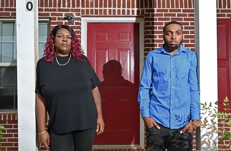 Trevontae Shareef and his mother, Eugena Shareef, seen here outside their Covington home, say that people angry about his alleged involvement in Operation Not Forgotten have pulled up to the house, brandishing guns and challenging Trevontae to step outside and fight. (Hyosub Shin / Hyosub.Shin@ajc.com)