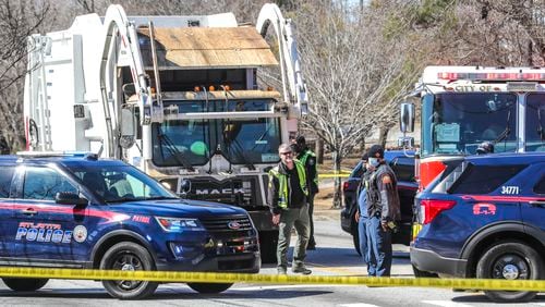 A pedestrian was killed Monday on a busy road in southwest Atlanta. The body was removed from the scene along Campbellton Road near the Andrew and Walter Young Family YMCA. (John Spink / John.Spink@ajc.com)