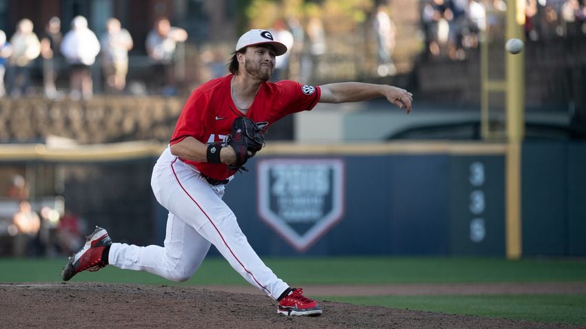 Bulldogs pitcher Collin Caldwell delivers during the 20th Spring Classic against Georgia Tech on Sunday at Coolray Field in Lawrenceville. (Jamie Spaar / for The Atlanta Journal-Constitution)