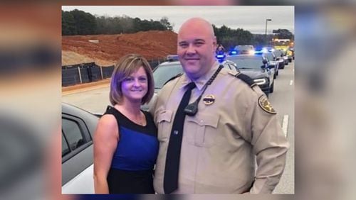 Butts County sheriff's Sgt. Trent Anderson and his wife Jennifer.