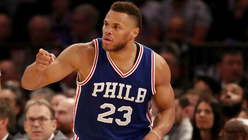 Justin Anderson of the Philadelphia 76ers celebrates his basket in the second half against the New York Knicks at Madison Square Garden on April 12, 2017 in New York City.