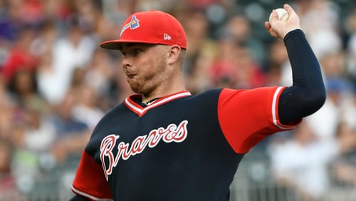 Atlanta Braves' Sean Newcomb pitches during the first inning of a baseball game against the Colorado Rockies, Saturday, Aug. 26, 2017, in Atlanta. (AP Photo/John Amis)