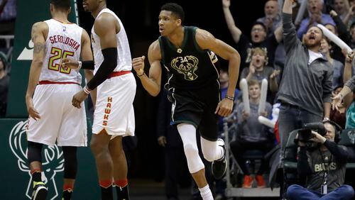 Milwaukee Bucks’ Giannis Antetokounmpo reacts after making a shot in the final minutes of the second half of an NBA basketball game against the Atlanta Hawks Friday, March 24, 2017, in Milwaukee. The Bucks won 100-97. (AP Photo/Morry Gash)