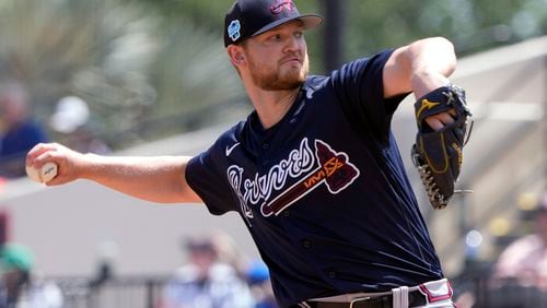 Atlanta Braves' Mike Soroka pitches against the Detroit Tigers in the first inning of a spring training baseball game, Wednesday, March 22, 2023, in Lakeland, Fla. (AP Photo/John Raoux)