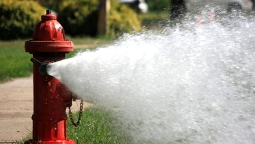 Fire Department hydrant flushing in Sandy Springs in the coming weeks could result in some residents seeing discolored water coming out of their taps. AJC FILE
