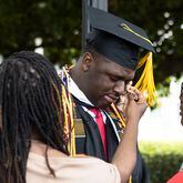 Amir R. Johnson gets emotional after the Morehouse College commencement ceremony on Sunday, May 21, 2023, on Century Campus in Atlanta. The graduation marked Morehouse College's 139th commencement program. CHRISTINA MATACOTTA FOR THE ATLANTA JOURNAL-CONSTITUTION