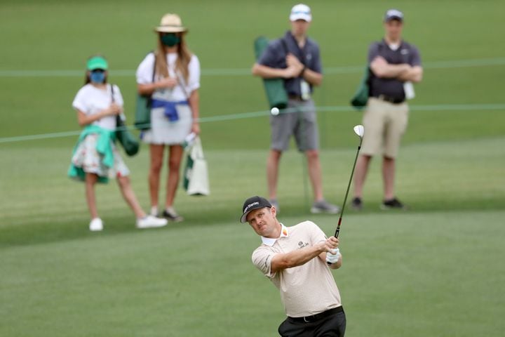 April 10, 2021, Augusta: Justin Rose chips to the second hole during the third round of the Masters at Augusta National Golf Club on Saturday, April 10, 2021, in Augusta. Curtis Compton/ccompton@ajc.com