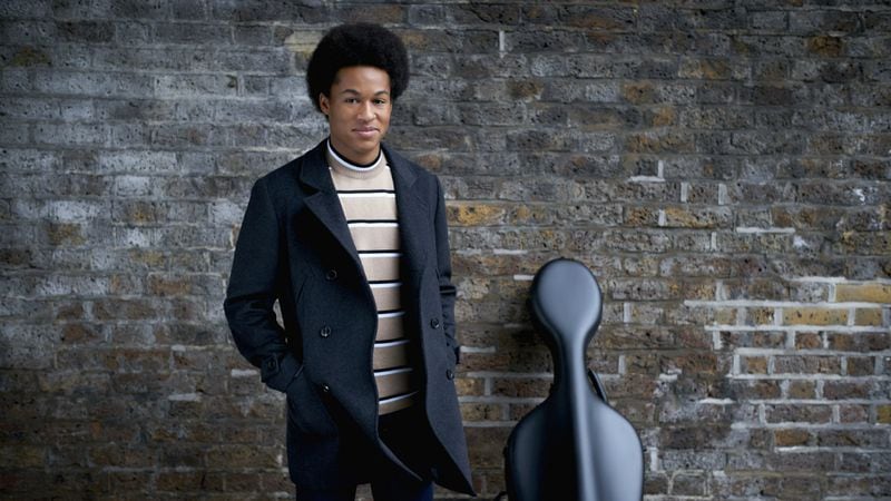 In this undated phote supplied by Kensington Palace, cellist Sheku Kanneh-Mason, who performed Saturday, May 19, 2018, at the wedding of Prince Harry and Meghan Markle, poses for a photograph.