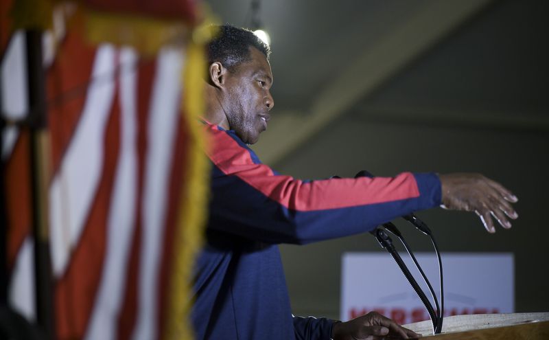 Republican U.S. Senate candidate Herschel Walker speaks to supporters during a campaign rally at The Mill on Etowah Thursday, Nov. 10, 2022. (Daniel Varnado/For the AJC)
