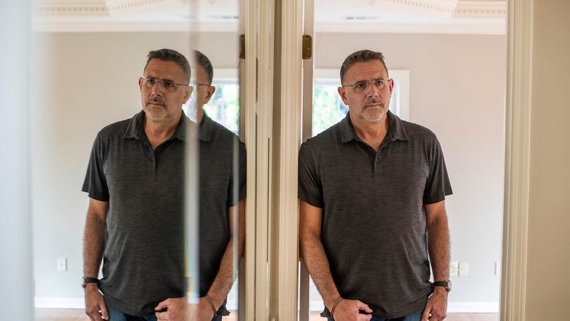 03/26/2021 —Atlanta, Georgia —John Cirillo, 57, is photographed at his residence in Johns Creek, Friday, March 26, 2021. Cirillo, a single father, received rental assistance after losing his job in March. (Alyssa Pointer / Alyssa.Pointer@ajc.com)