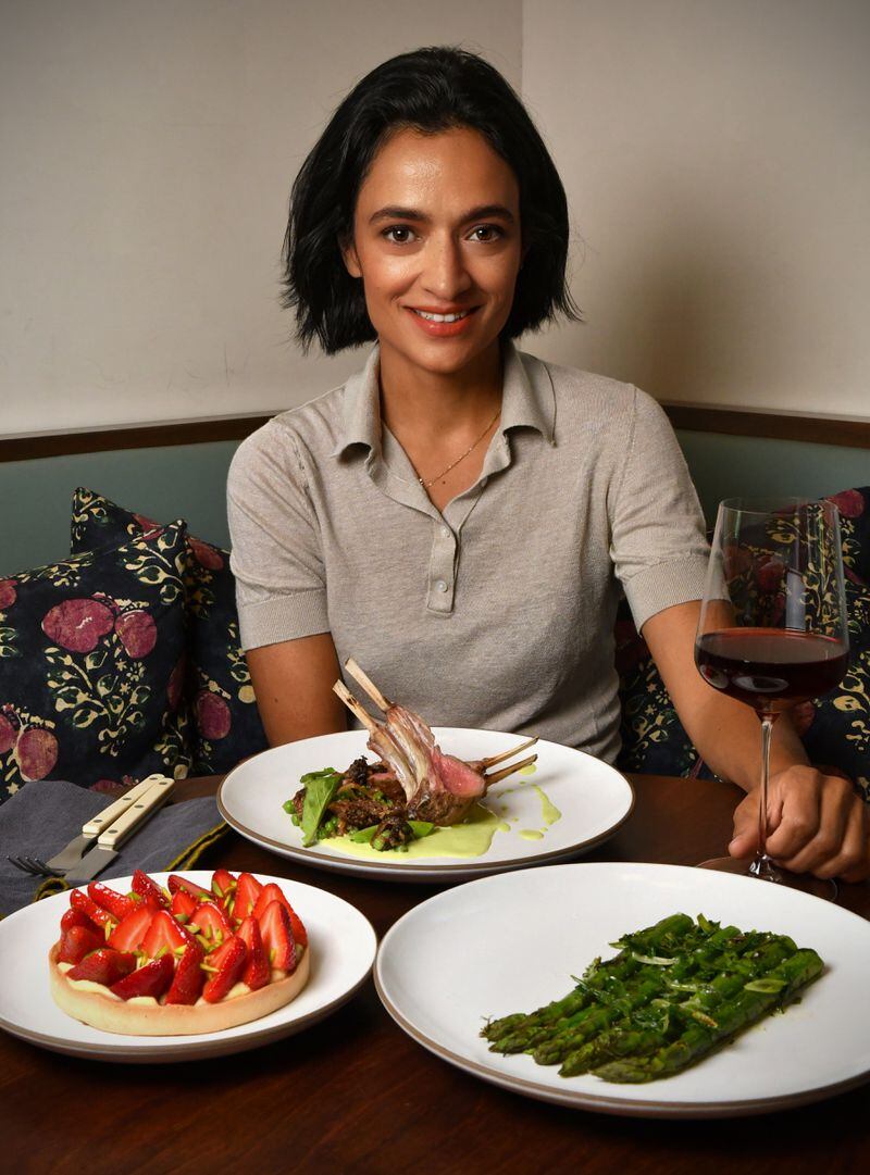 “In my mind, spring is about a fresh start and rebirth,” says Le Bon Nosh chef Forough Vakili. She's shown with spring recipes she's sharing with AJC readers: (clockwise from left) Strawberry Tart, Georgia-Grown Grilled Lamb Rack with Pea and Morel Ragu, and Grilled Green Asparagus with Ramps Sauce. (Styling by chef Forough Vakili / Chris Hunt for the AJC)