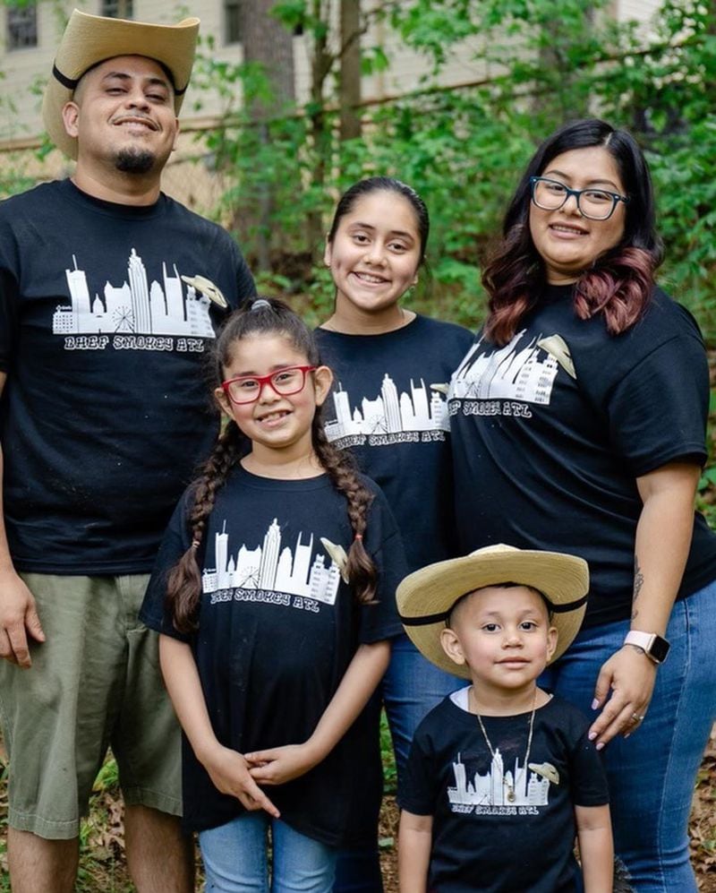 Mauro Cruz, known as Chef Smokey, started making birria to support his family: daughter Isabella (with glasses), daughter Yareli, wife Jaqueline and Mauro Jr. — aka Lil Smokey. Courtesy of Alexis Garcia