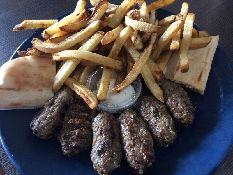 The beef kebab with hand-cut fries at Cafe Raik. CONTRIBUTED BY WENDELL BROCK