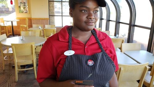 Skiteafa Allen, who works at a Wendy’s restaurant in Suwanee, is among a growing number of Georgia employees who rely on early access to a portion of their wages, rather than waiting for traditional paydays a week or two out. MATT KEMPNER / AJC