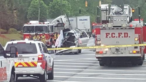 Four teenage boys are dead after a crash Monday, April 24, 2017, between a tractor-trailer and a Lincoln Navigator, Fulton County police said. (Credit: Channel 2 Action News)