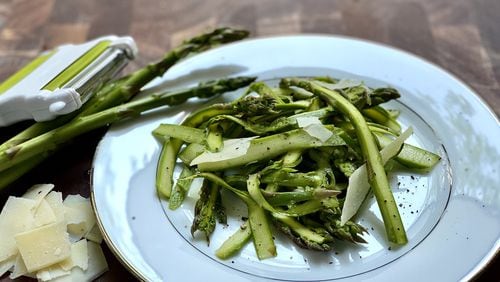 Parmesan slices are one way to dress up Shaved Asparagus Salad. CONTRIBUTED BY KELLIE HYNES