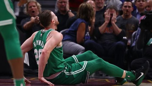Gordon Hayward  sits on the floor after being injured while playing the Cleveland Cavaliers at Quicken Loans Arena Oct. 17, 2017 in Cleveland.