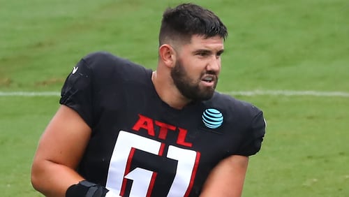 Falcons rookie center Matt Hennessy loosens up for the second scrimmage on Monday, August 24, 2020 in Flowery Branch.    Curtis Compton ccompton@ajc.com