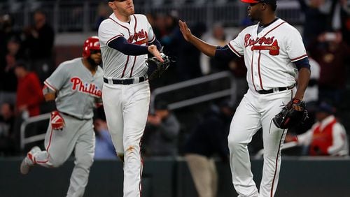 ATLANTA, GA - APRIL 16:  Arodys Vizcaino #38 of the Atlanta Braves reacts with Freddie Freeman #5 after  the final out in their 2-1 win over the Philadelphia Phillies at SunTrust Park on April 16, 2018 in Atlanta, Georgia.  (Photo by Kevin C. Cox/Getty Images)