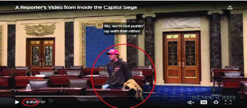 Milton resident Bruno Cua is seen here on the floor of the U.S. Senate during the Jan. 6, 2021 U.S. Capitol riot.
