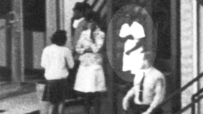 Mary Ellen Ford, highlighted in oval, was a cook at the Lorraine Motel on April 4, 1968, when the Rev. Dr. Martin Luther King Jr. was struck down by an assassin's bullet as he stood on the balcony outside his room, Room 306. Ford, who is pictured in the background of an iconic photo taken moments after the assassination, spoke out publicly for the first time this week as the nation prepares to observe the 50th anniversary of King's assassination.