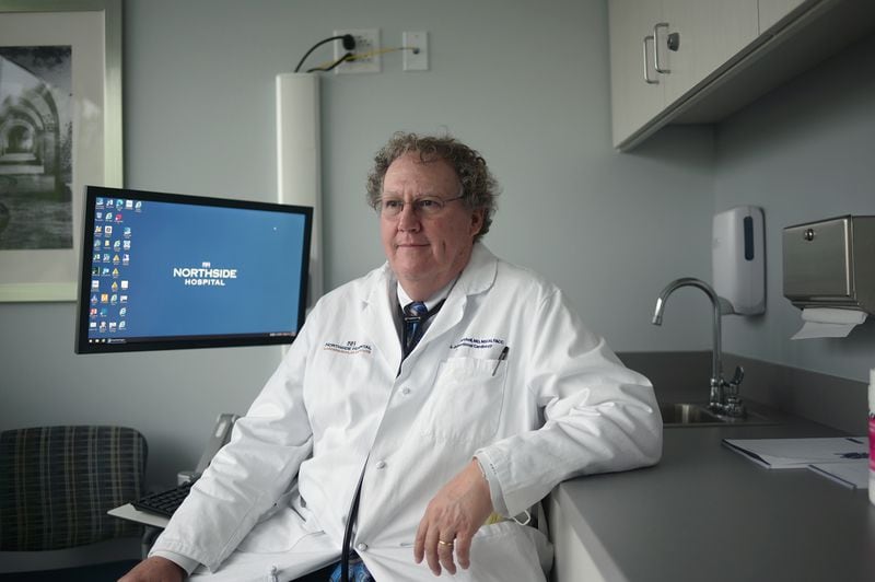 A portrait of Dr. Jeffrey Marshall, chief of Northside Hospital Cardiovascular Institute, who treats patients who suffer from long covid. He is pictured at NCVI on April 18, 2022.  (Natrice Miller / natrice.miller@ajc.com)