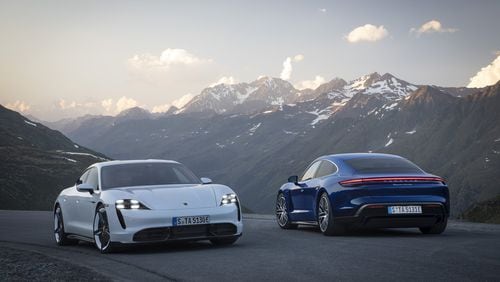 Porsche presented its first fully-electric sports car to the public Wednesday with a world premiere held simultaneously on three continents. The Taycan Turbo S (left) and the Taycan Turbo (right).