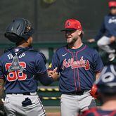 Atlanta Braves catcher Chadwick Tromp greets with relief pitcher A.J. Minter after they worked out in the bullpen during spring training workouts at CoolToday Park, Monday, Feb. 19, 2024, in North Port, Florida. (Hyosub Shin / Hyosub.Shin@ajc.com)