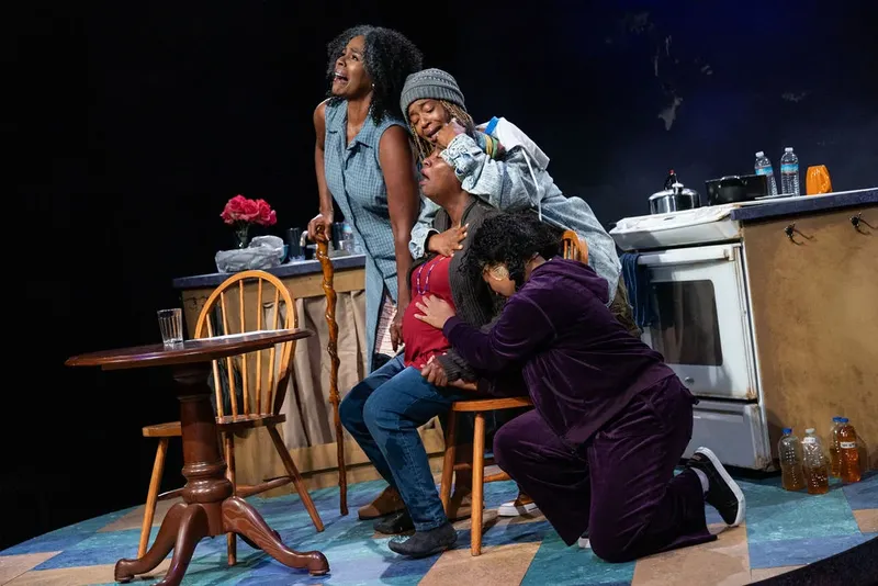 From left, Big Ma (Terry Henry), Reesee (Asha Basha Duniani in hat), Ainee (Parris Sarter, seated) and Plum (Morgan Crumbly) play a family faced with an overwhelming crisis in "Cullud Wattah." Photo: Casey Gardner Ford