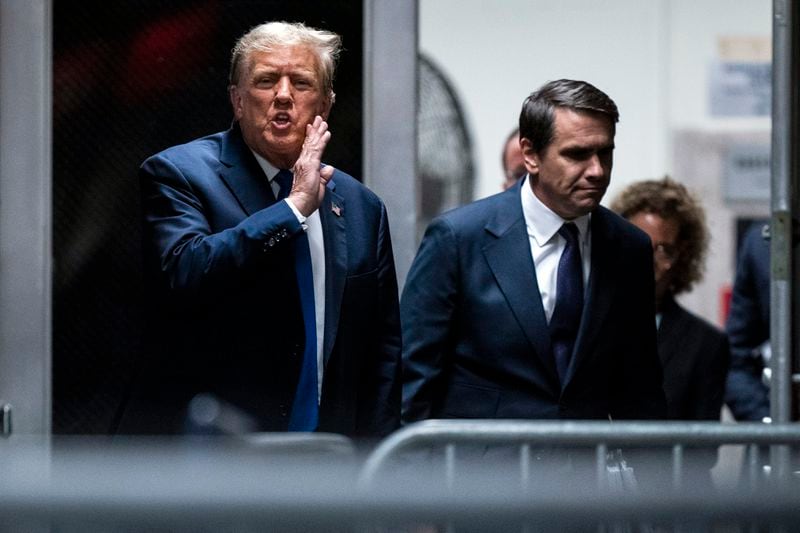 Former President Donald Trump speaks alongside attorney Todd Blanche as they return from a lunch break in his trial at Manhattan criminal court in New York on Thursday, April 18, 2024. (Jabin Botsford/The Washington Post via AP, Pool)